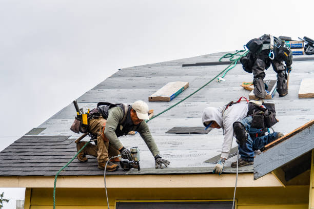 Professional Gutter Installation technician working in Millers Falls, MA